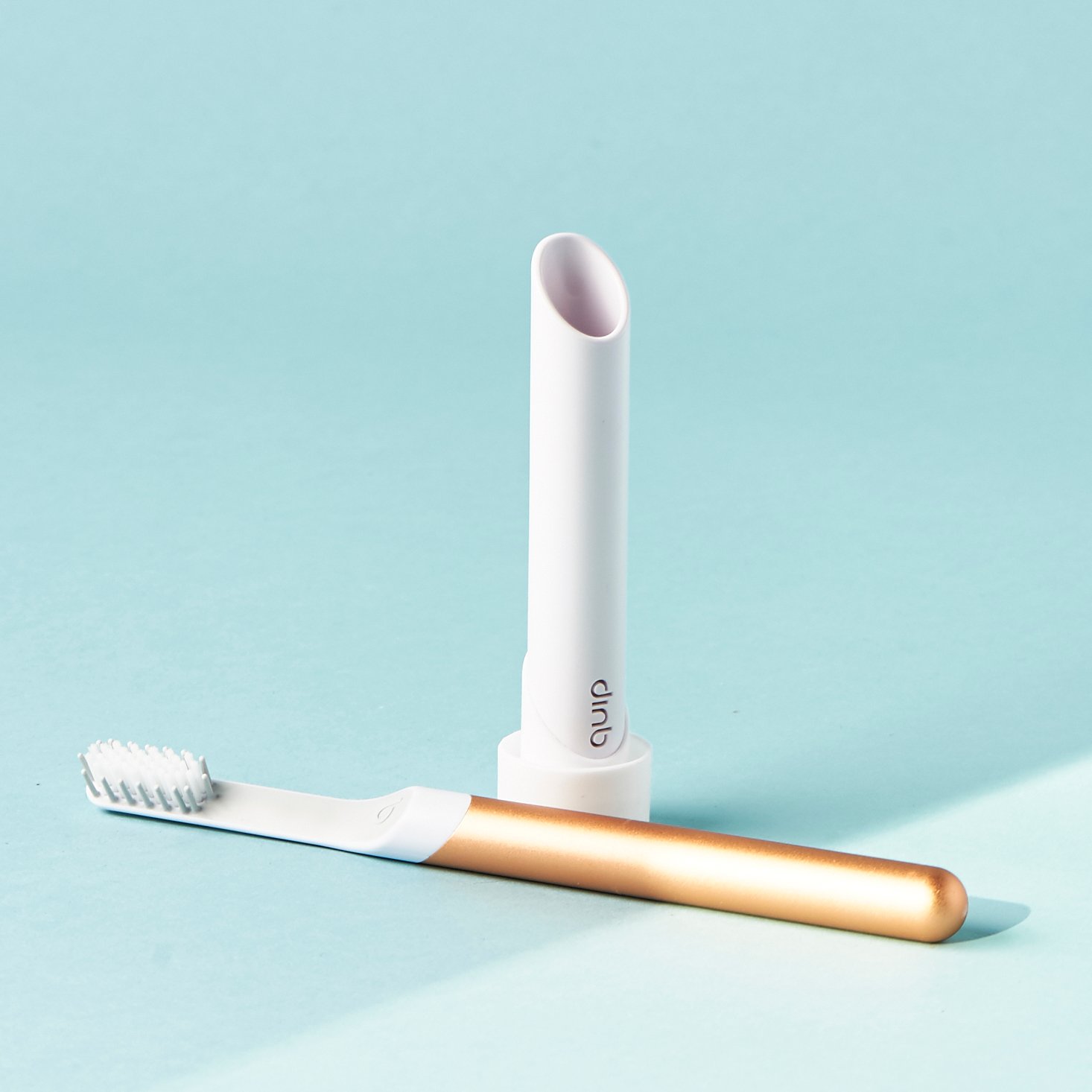 Quip toothbrush and toothbrush holder