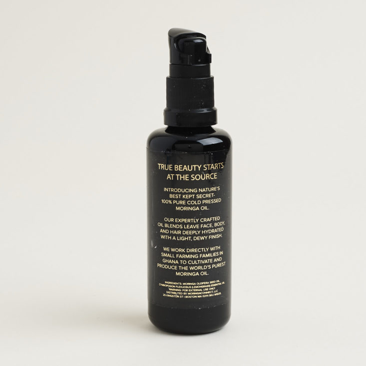 back of bottle of True Moringa Alive Face Hair and Body Oil