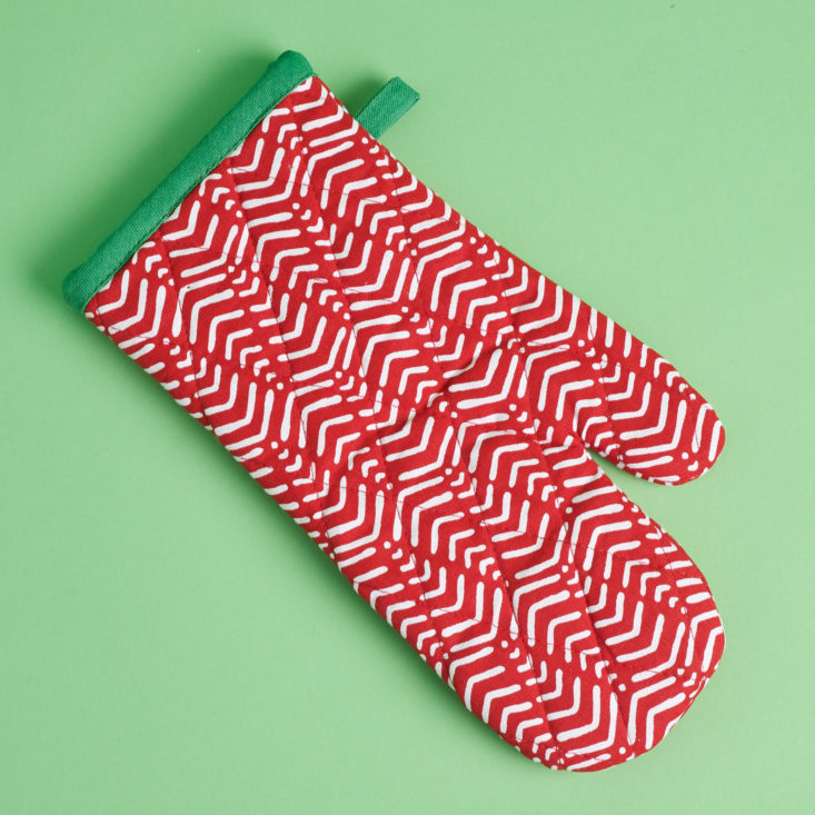 red patterned oven mitt 