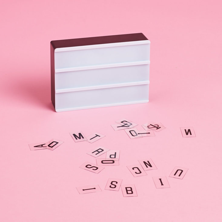 mini light box with letters scattered in front