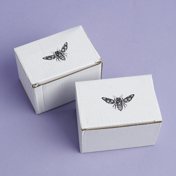 two heart and honey bee logo stamped boxes