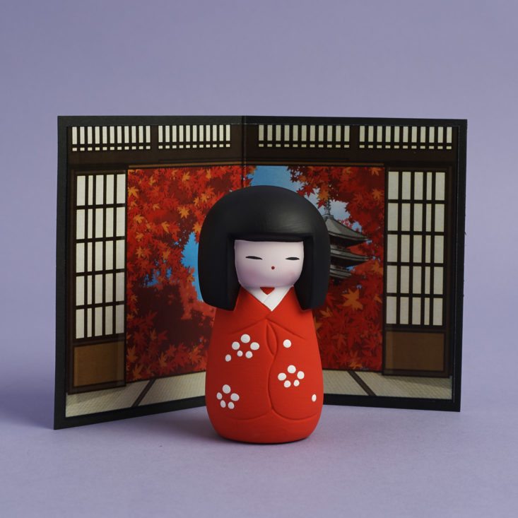 Kokeshi doll under Momiji