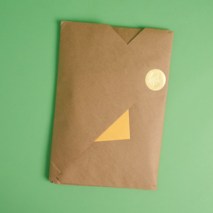 kraft paper-wrapped packet of goodies from Rad and Hungry x Colombia