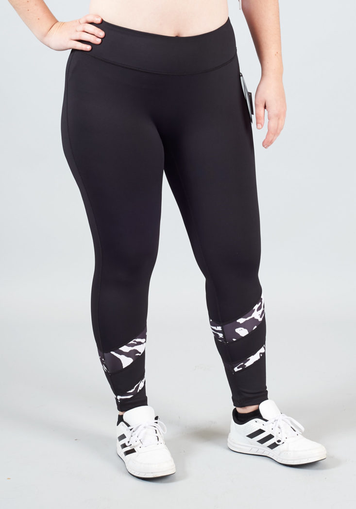 black leggings with striped details