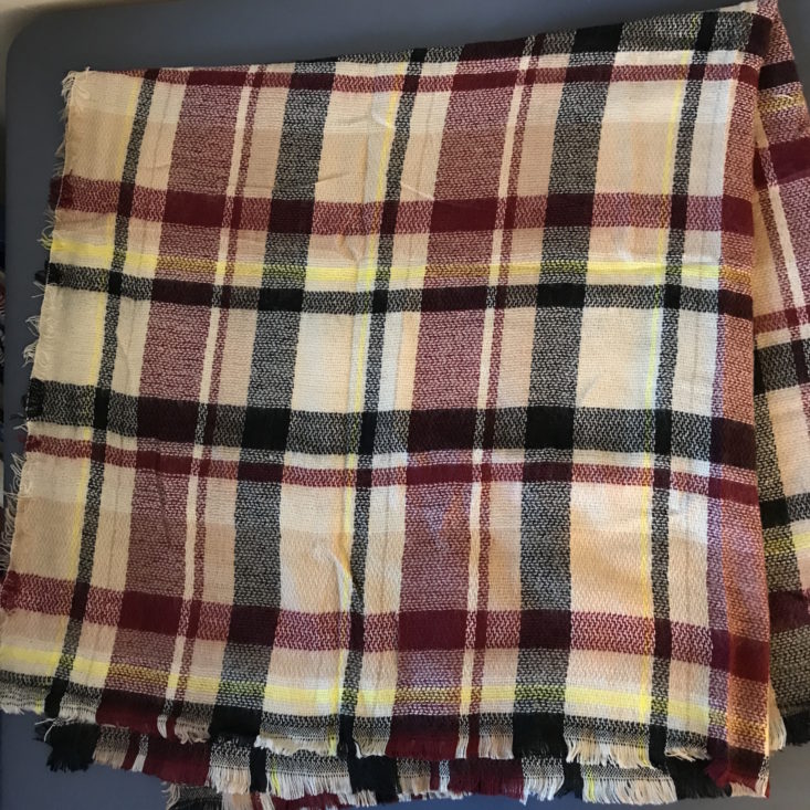 plaid blanket scarf draped