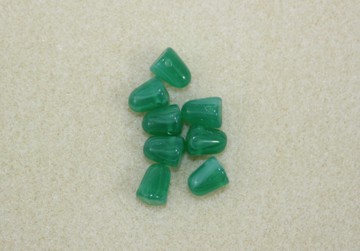 green gumdrop shaped beads
