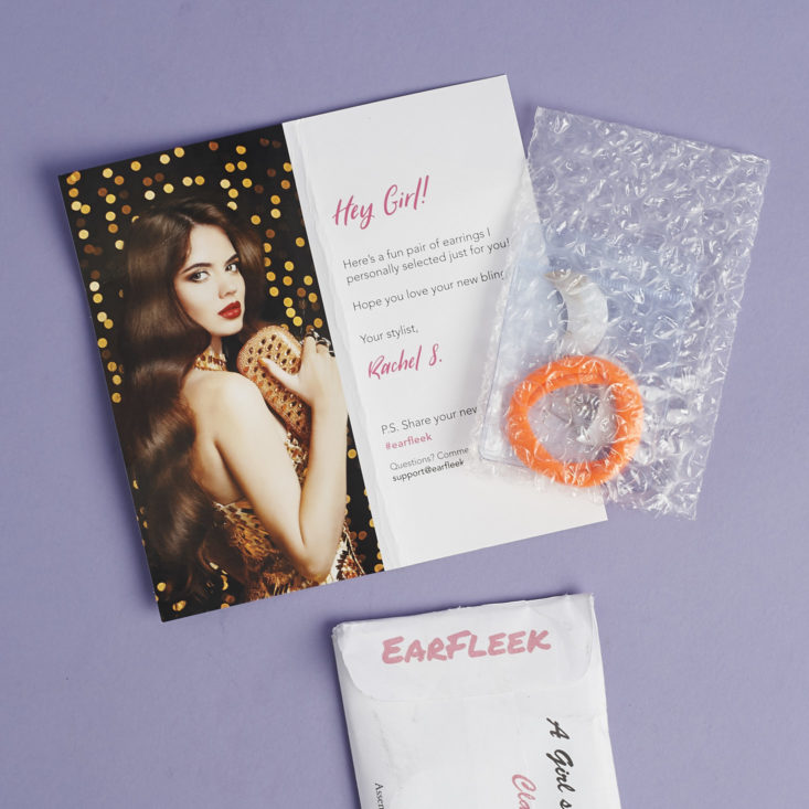 info card and earrings coming out of earfleek package