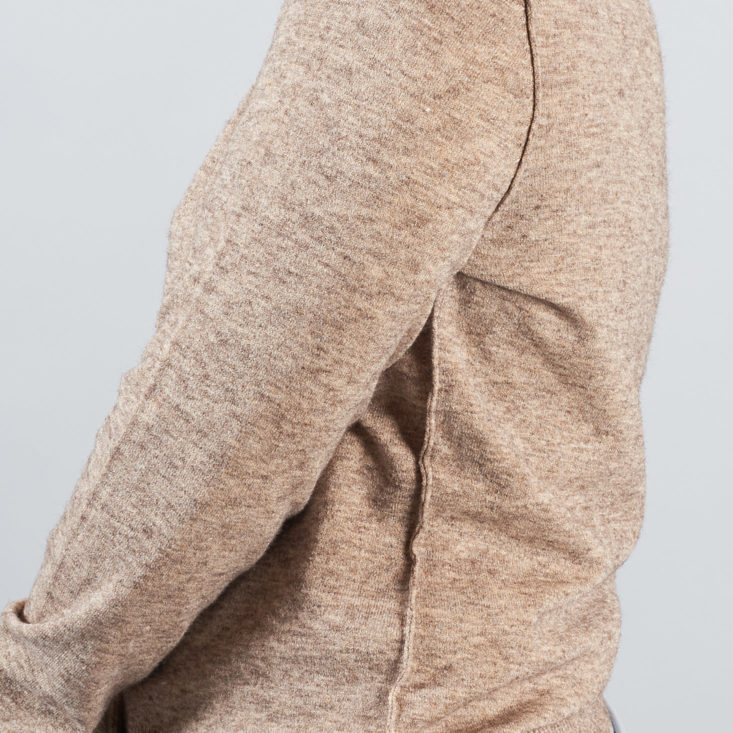 side seam detail on tan sweater