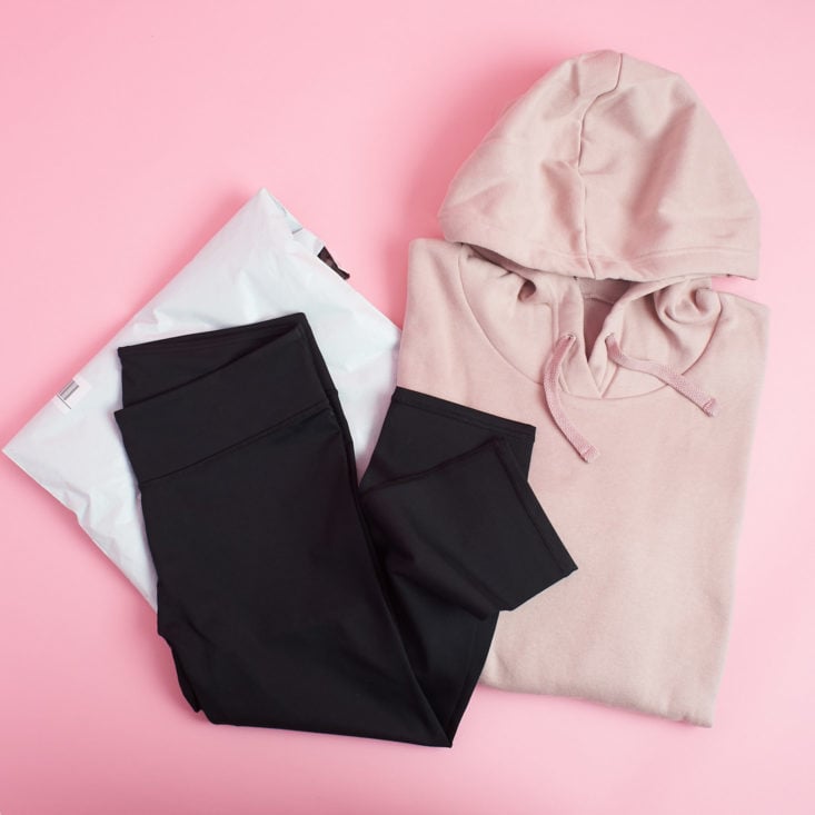 december outfit from fabletics in pink and black