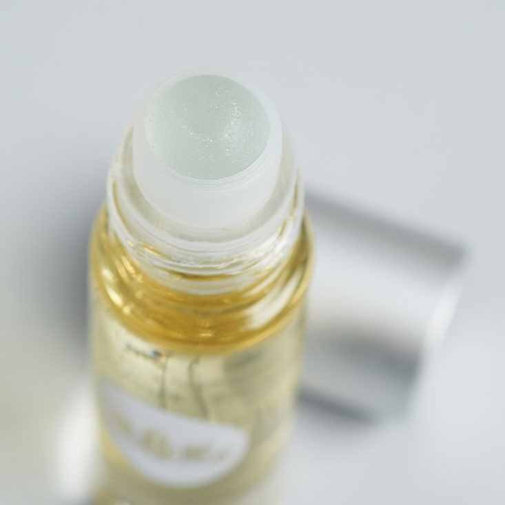 the rollerball tip of the gaia collective rollerball essential oil blend for december 2017