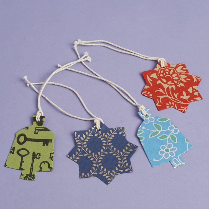 set of four patterned colorful gift tags