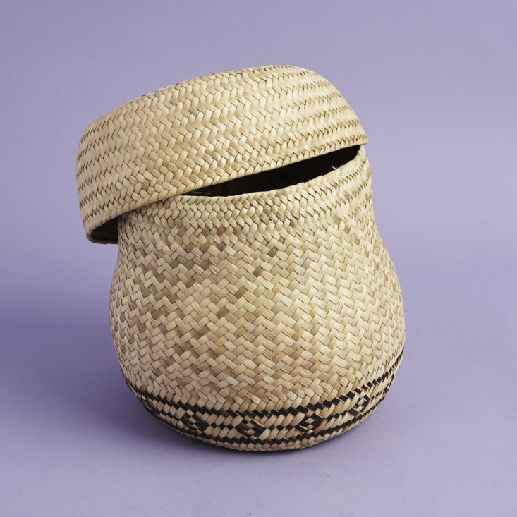 palm leaf basket with lid slightly off