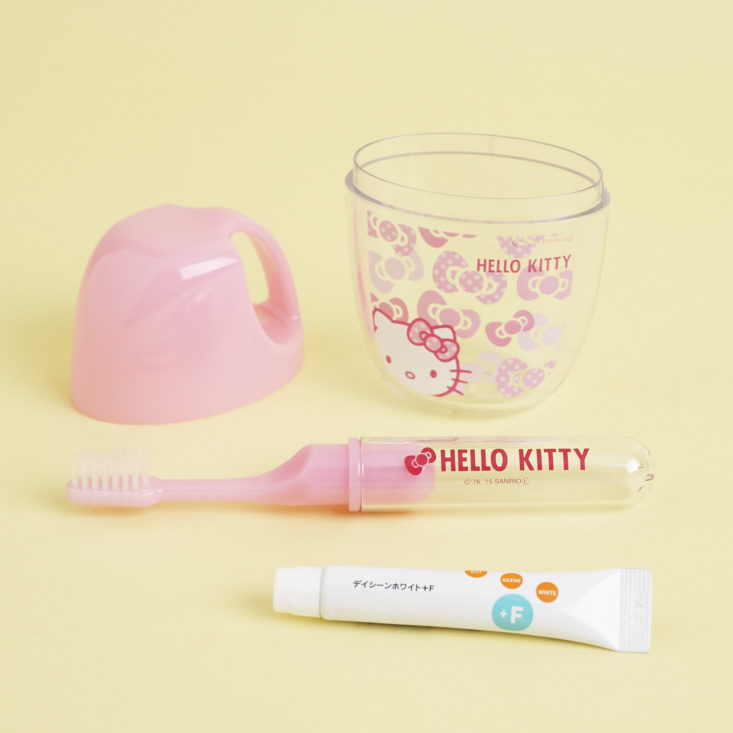 contents of hello kitty travel toothbrush set