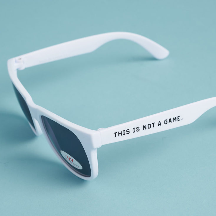 retro white sunglasses with saying on the side