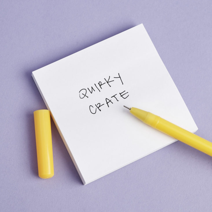 a note written in the black ink of a fine-pointed yellow pen with a blushing emoji on top