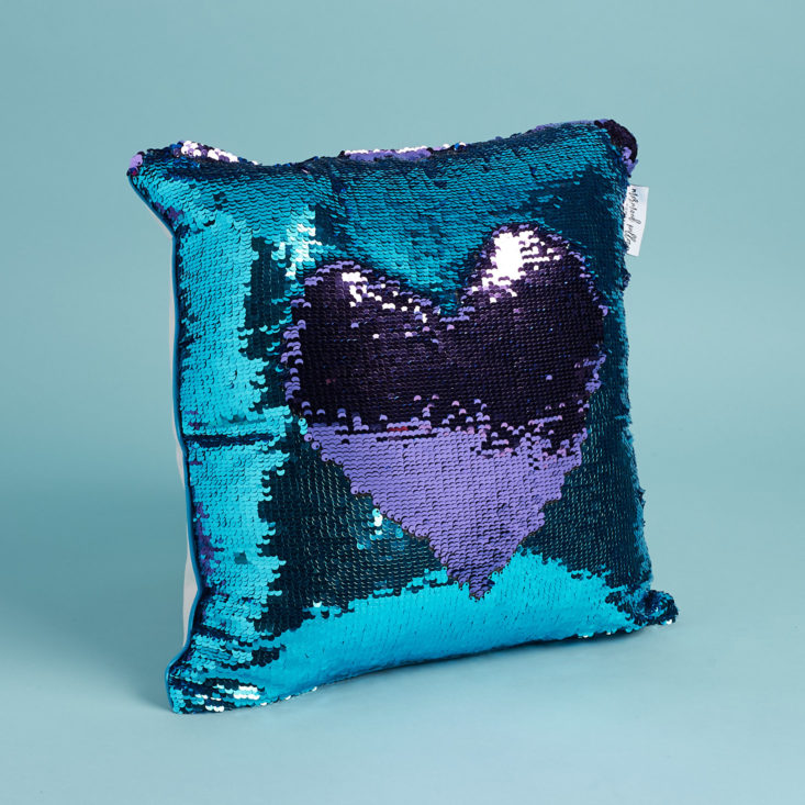 blue mermaid pillow with heart pattern in it