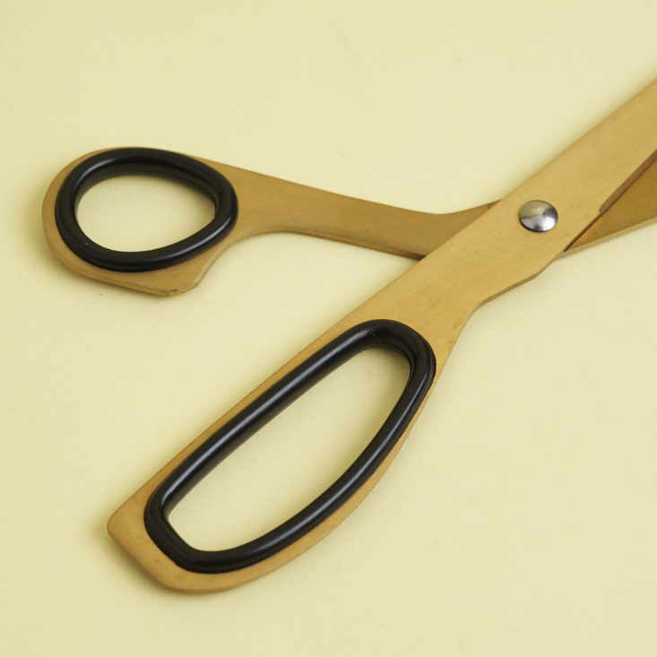 close up of brass scissors handles
