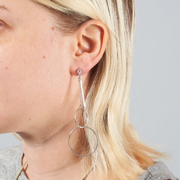 silver mod modesty earrings on model