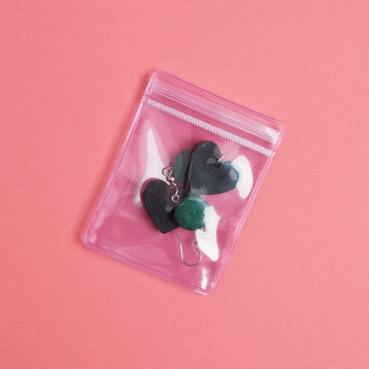 black heart earrings packaged