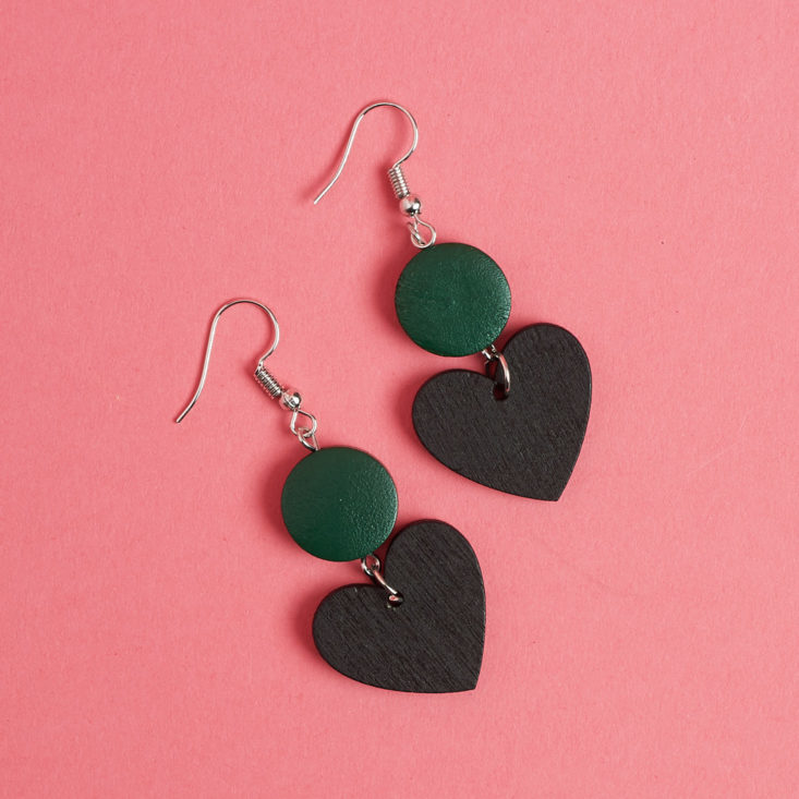 black heart dangling earrings with green discs