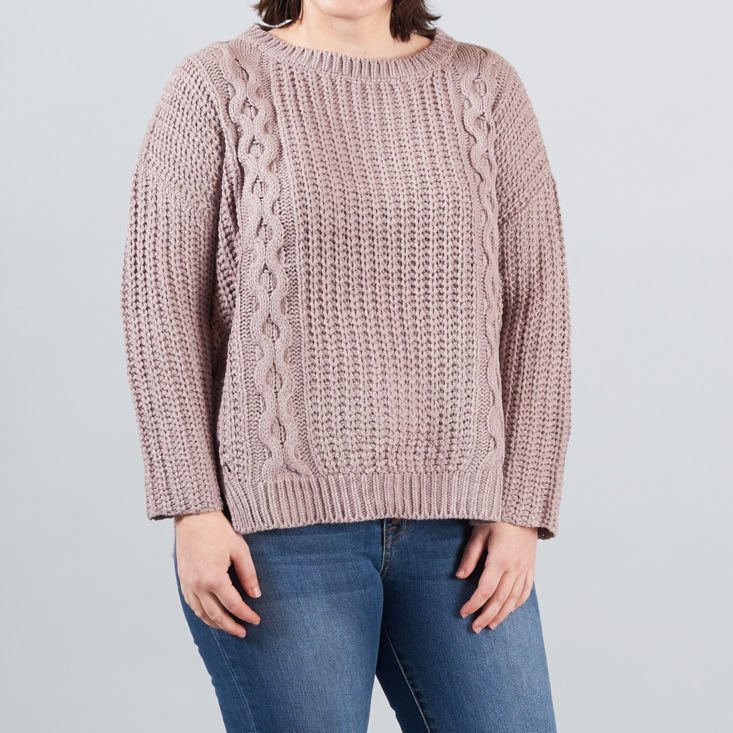 cable knit pattern on lilac sweater