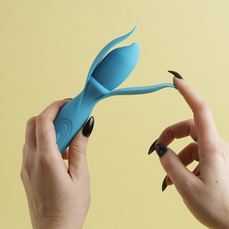 the lotus tri-point vibe with hand bending petal