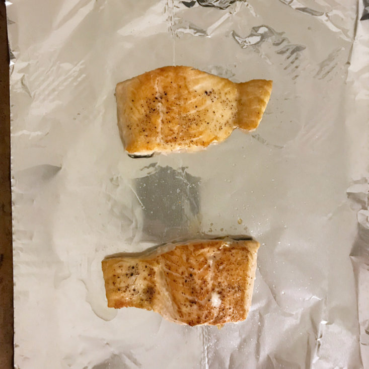 salmon filets on baking sheet