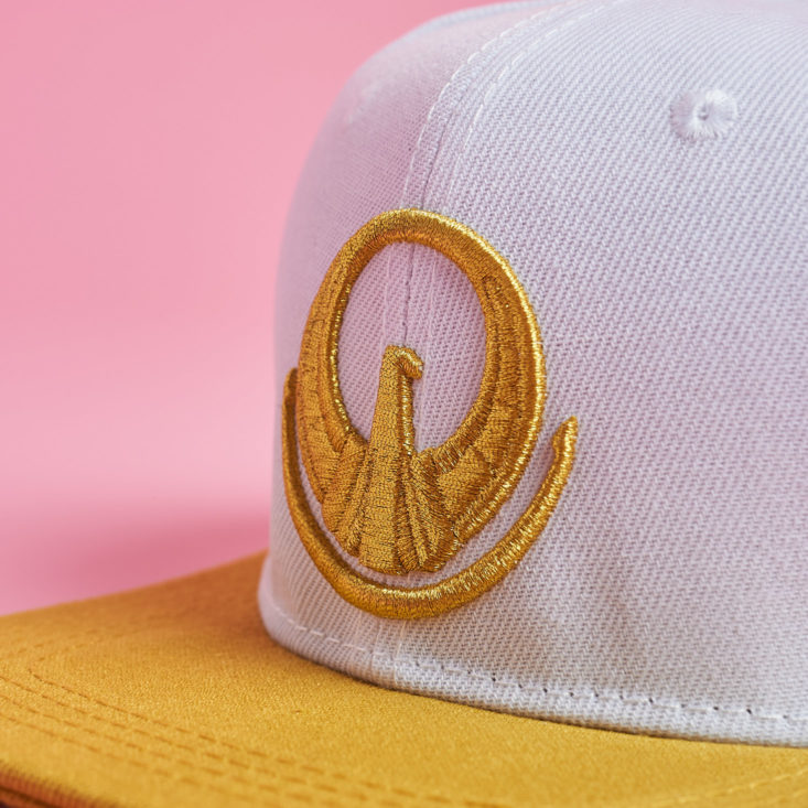 embroidered detail on anime flat brim hat