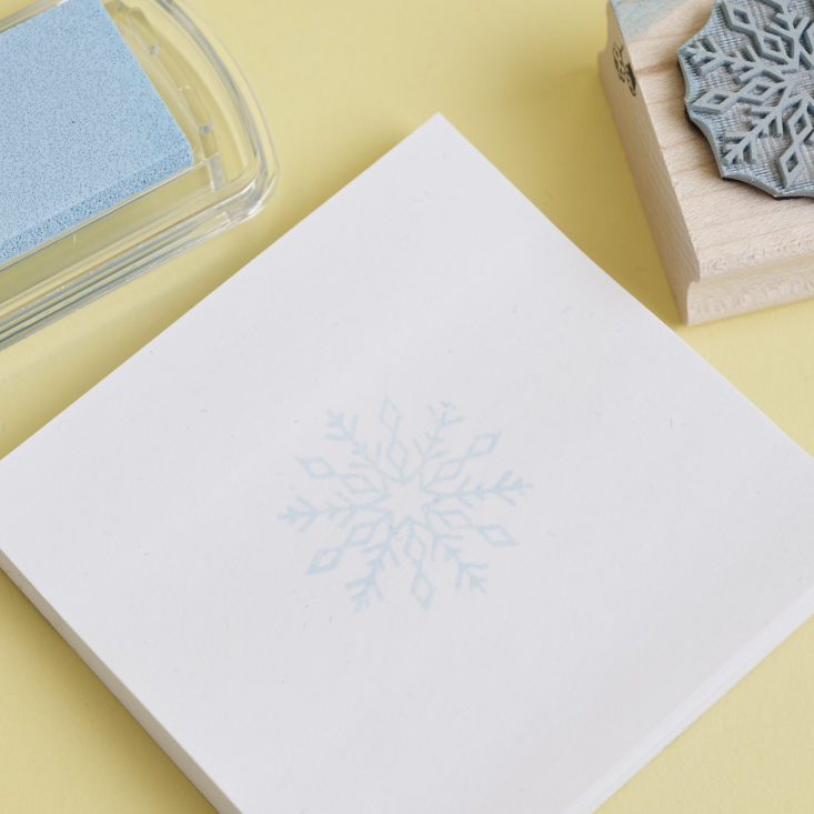 Snowflake stamped on paper