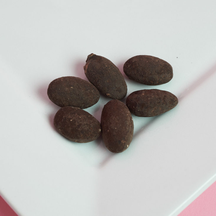 Skinny Dipped almonds in Dark Chocolate Cocoa on plate