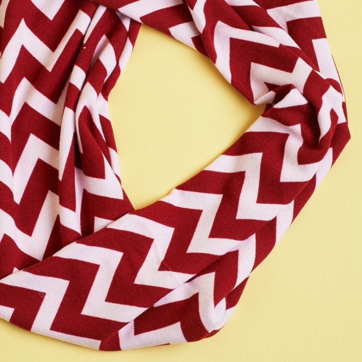 closeup on red and white infinity scarf