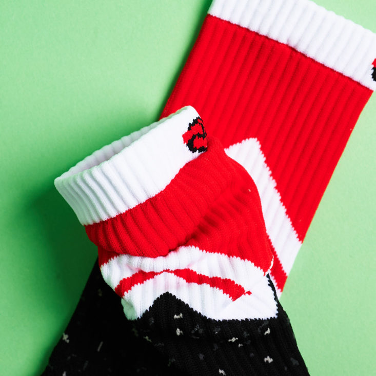 black socks with red accents cuff detail