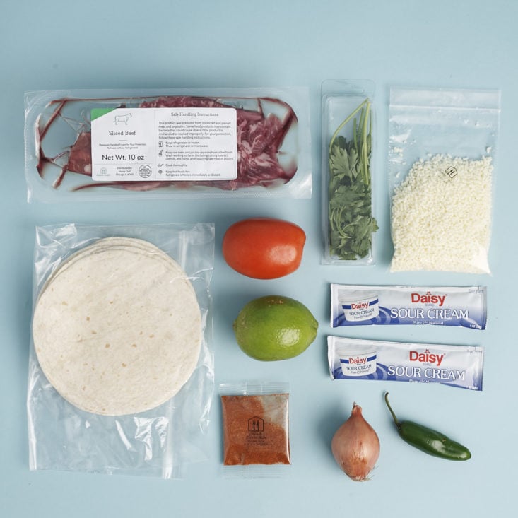Barbacoa Steak Tacos ingredients laid out