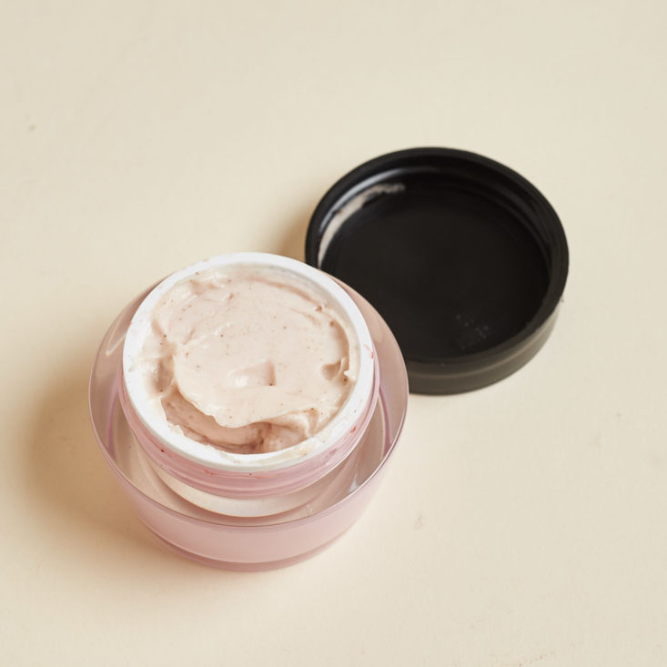 exfoliating cream in open pot