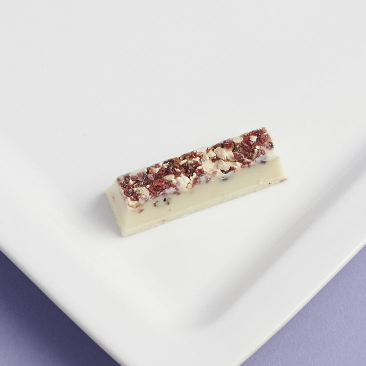 Luxury Yogurt with Double Berry and Almond kitkat on plate