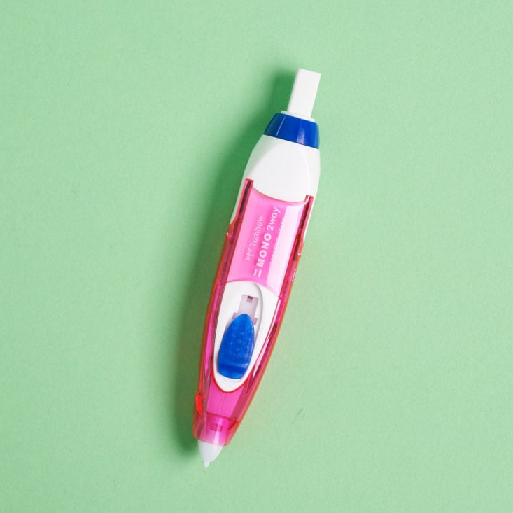 pink and blue corrector pen vertical angle