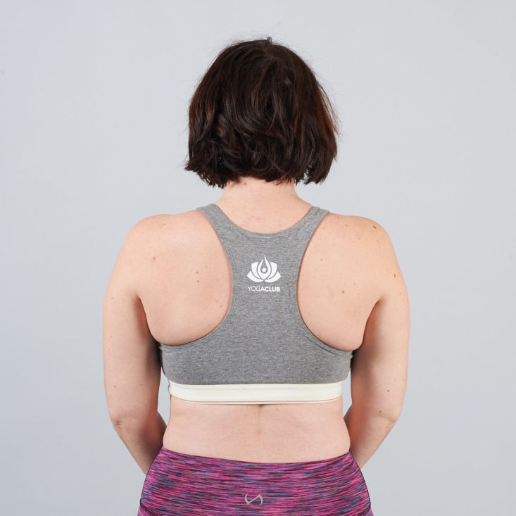 gray yoga club sports bra with logo on the back