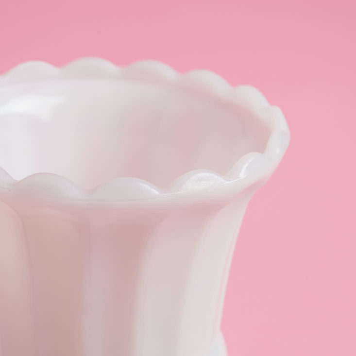 close up of vintage milk glass planter/vase