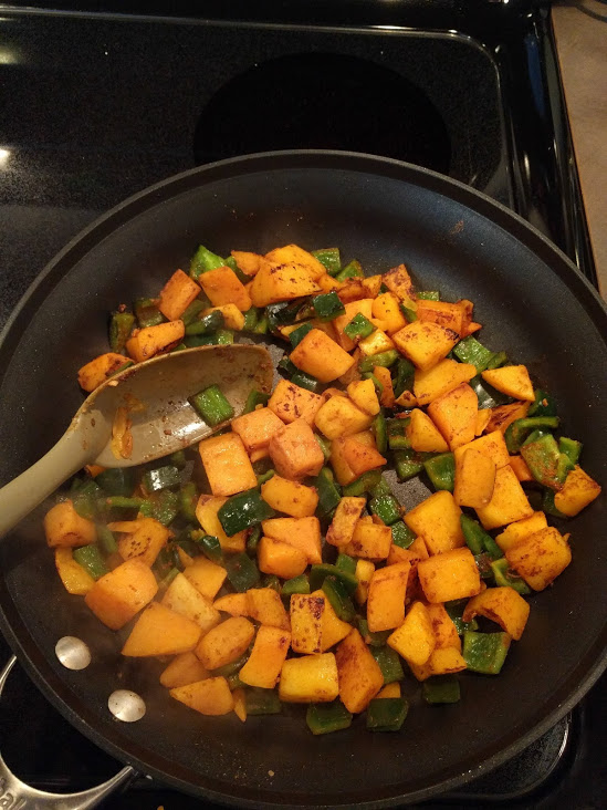 butternut squash and poblano peppers cooking