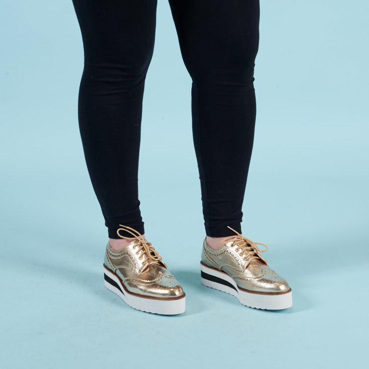 gold brogue shoes with white platforms