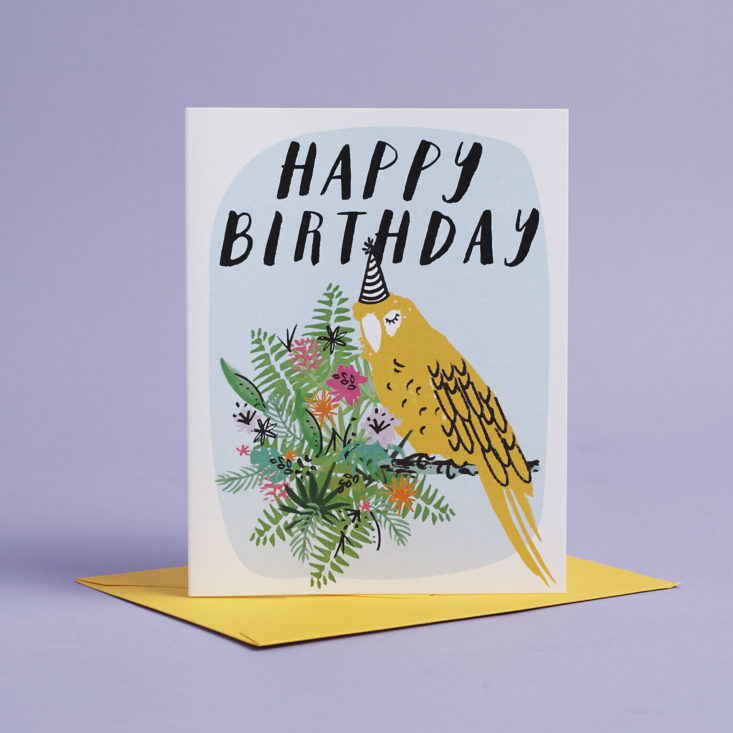 Happy Birthday card with parrot wearing party hat