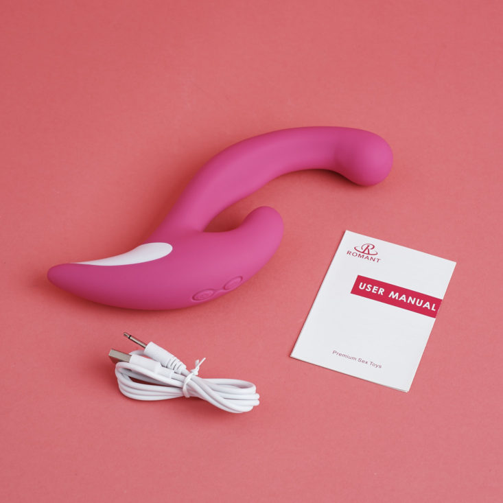 The Diana Vibrator with charging cord and instruction booklet