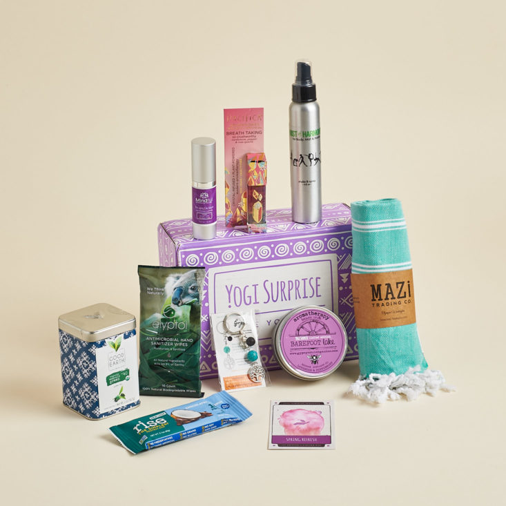 yogi surprise items including candles, snacks and other wellness items