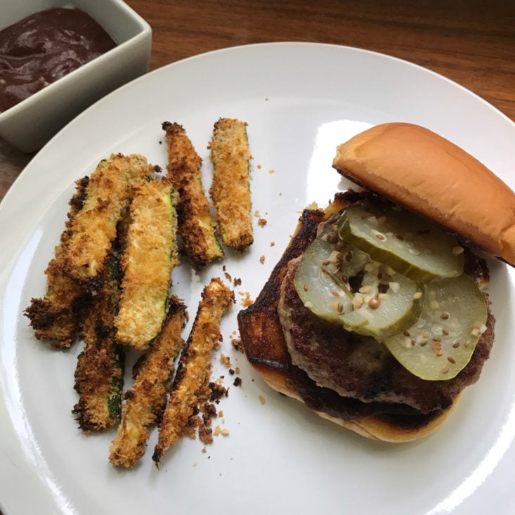 close up of BBQ Pork Burgers with Crispy Zucchini Fries & Smoky Ketchup on plate