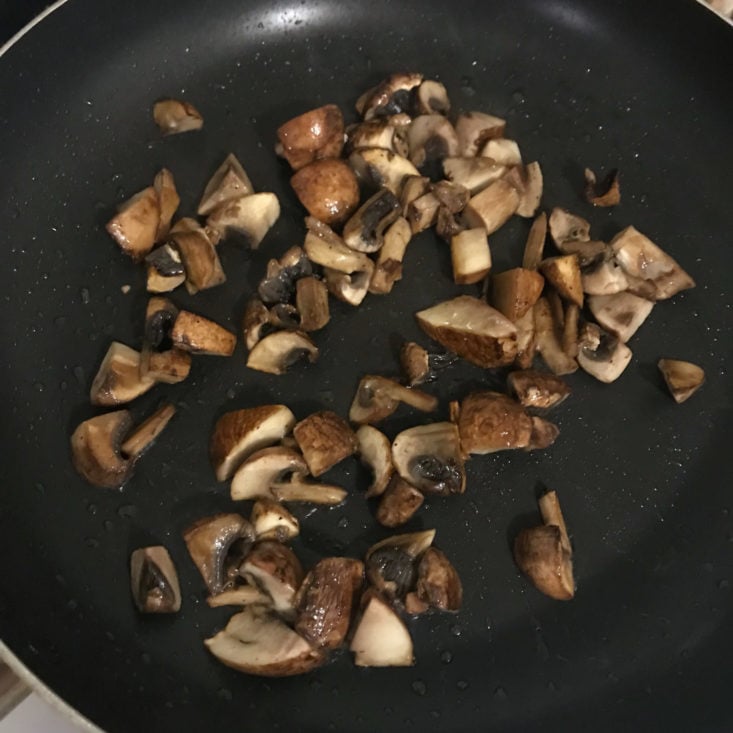 mushrooms cooking in pan