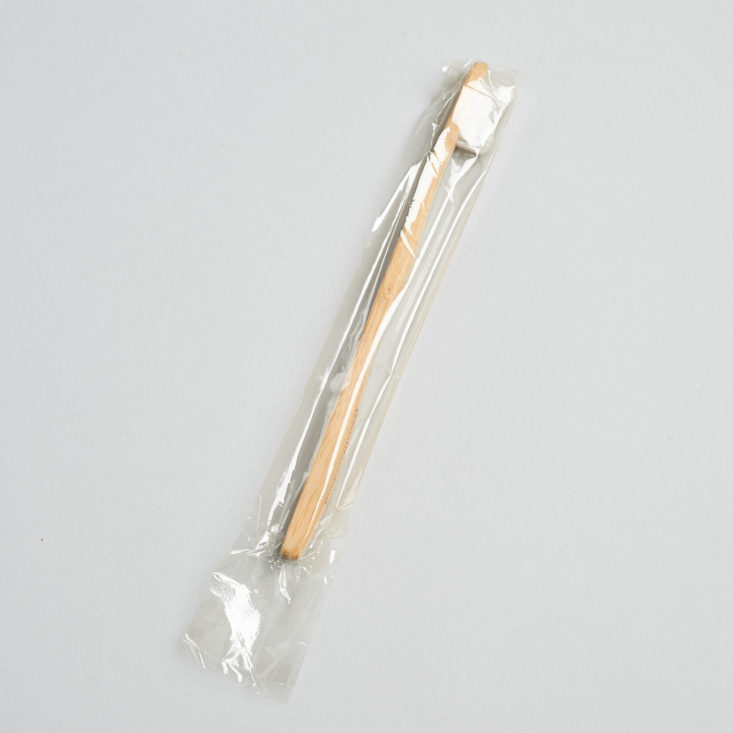 bamboo toothbrush in wrapper