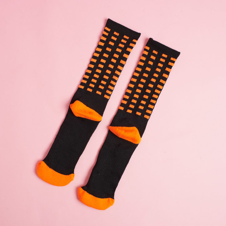 mini mystery box of awesome for april orange and black dotted socks