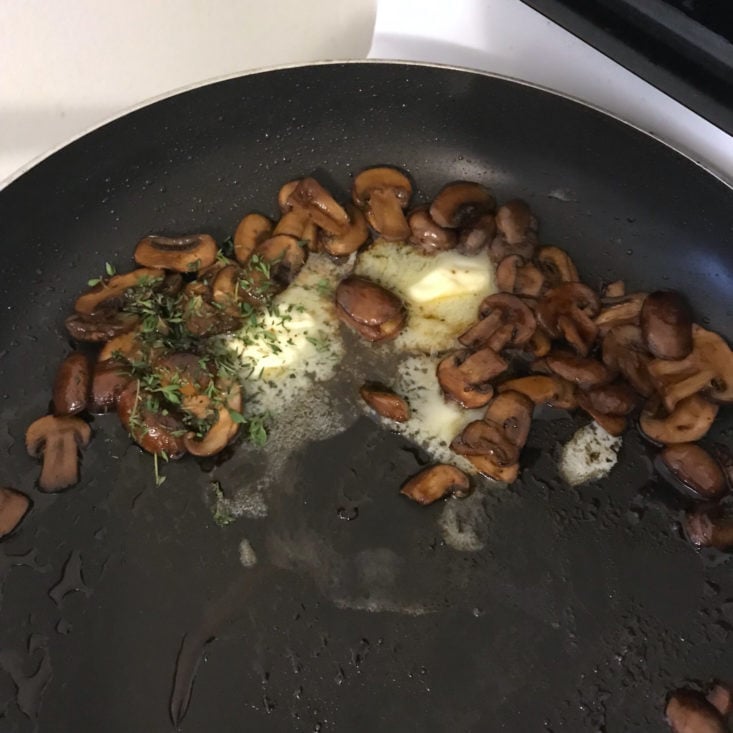 remaining mushrooms with butter and thyme in pan