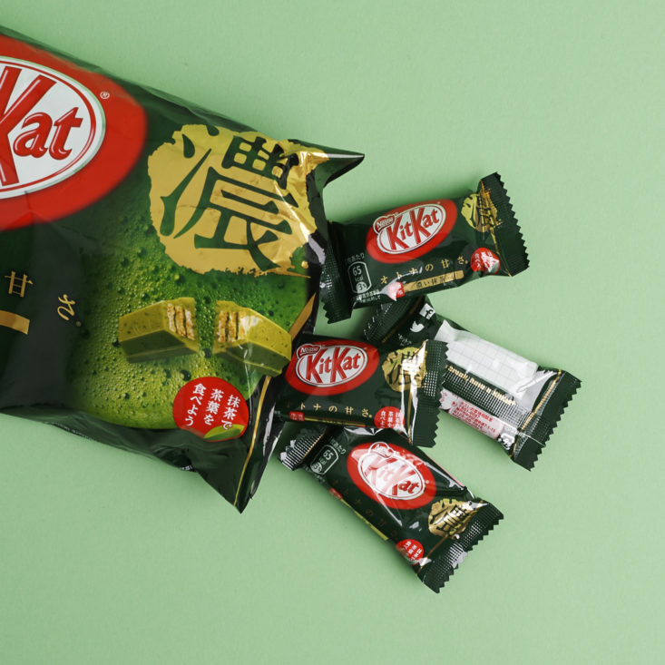 Dark Matcha Green Tea KitKats pouring out of bag