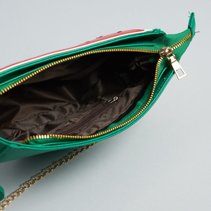 quirky crate inside of zippered purse